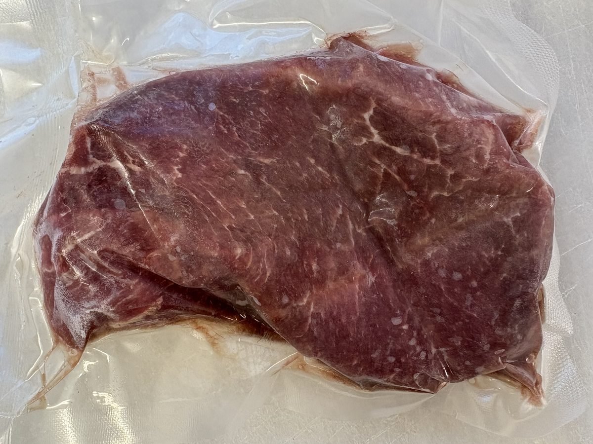 Chuck Ranch Steak, vacuum-sealed pack.