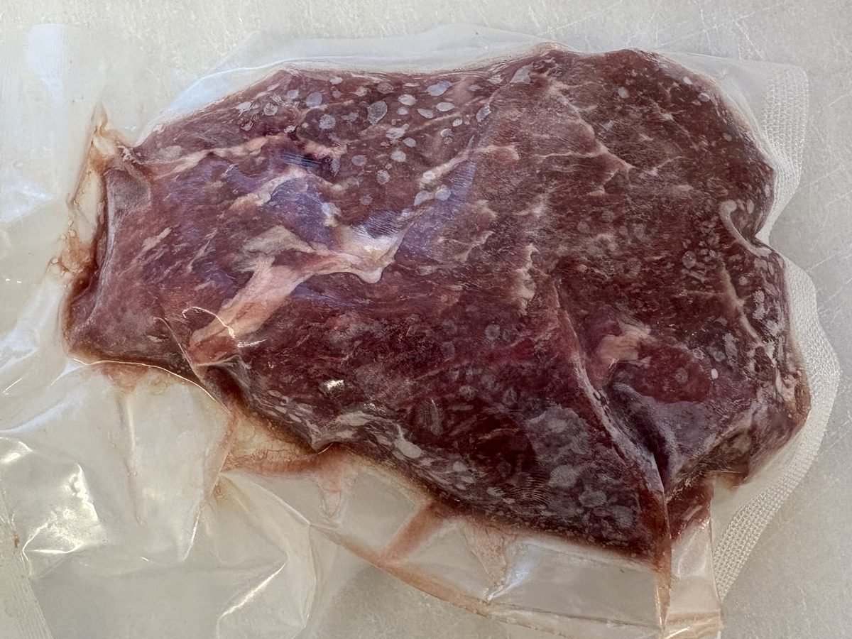 Denver Steak, vacuum-sealed pack.