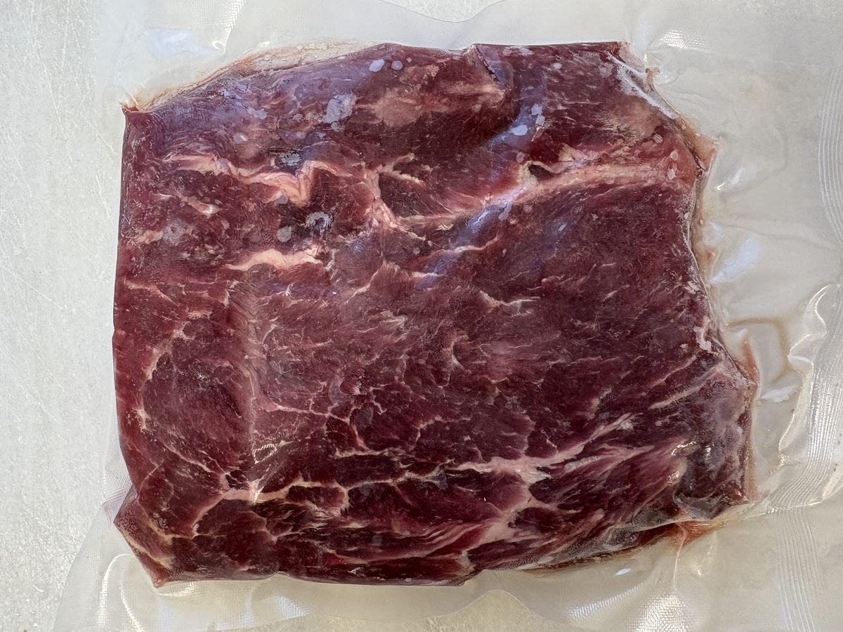 Flat Iron Steak, vacuum-sealed pack.