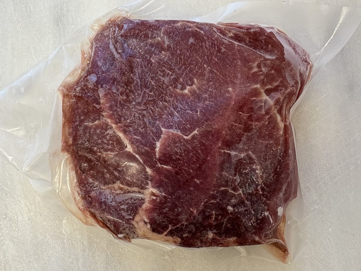Sirloin Tip Steak, vacuum-sealed pack.