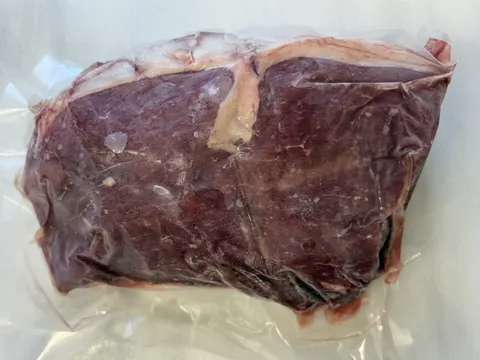 Eye of Round Roast, vacuum-sealed pack.