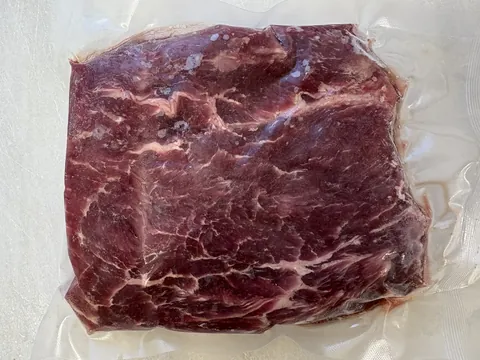 Flat Iron Steak, vacuum-sealed pack.