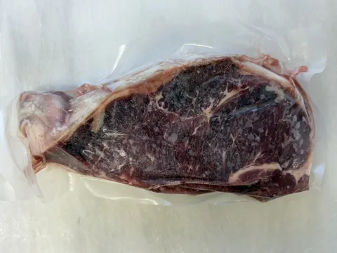 New York Strip, vacuum-sealed pack.